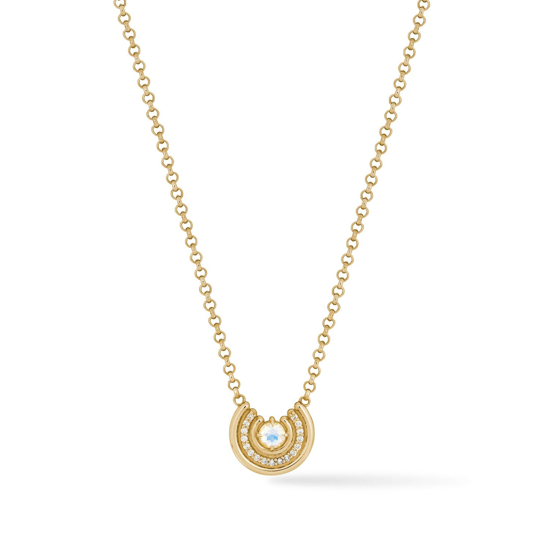 Faceted rainbow moonstone necklace with diamond halo in 14k gold, showing blue adularescence.