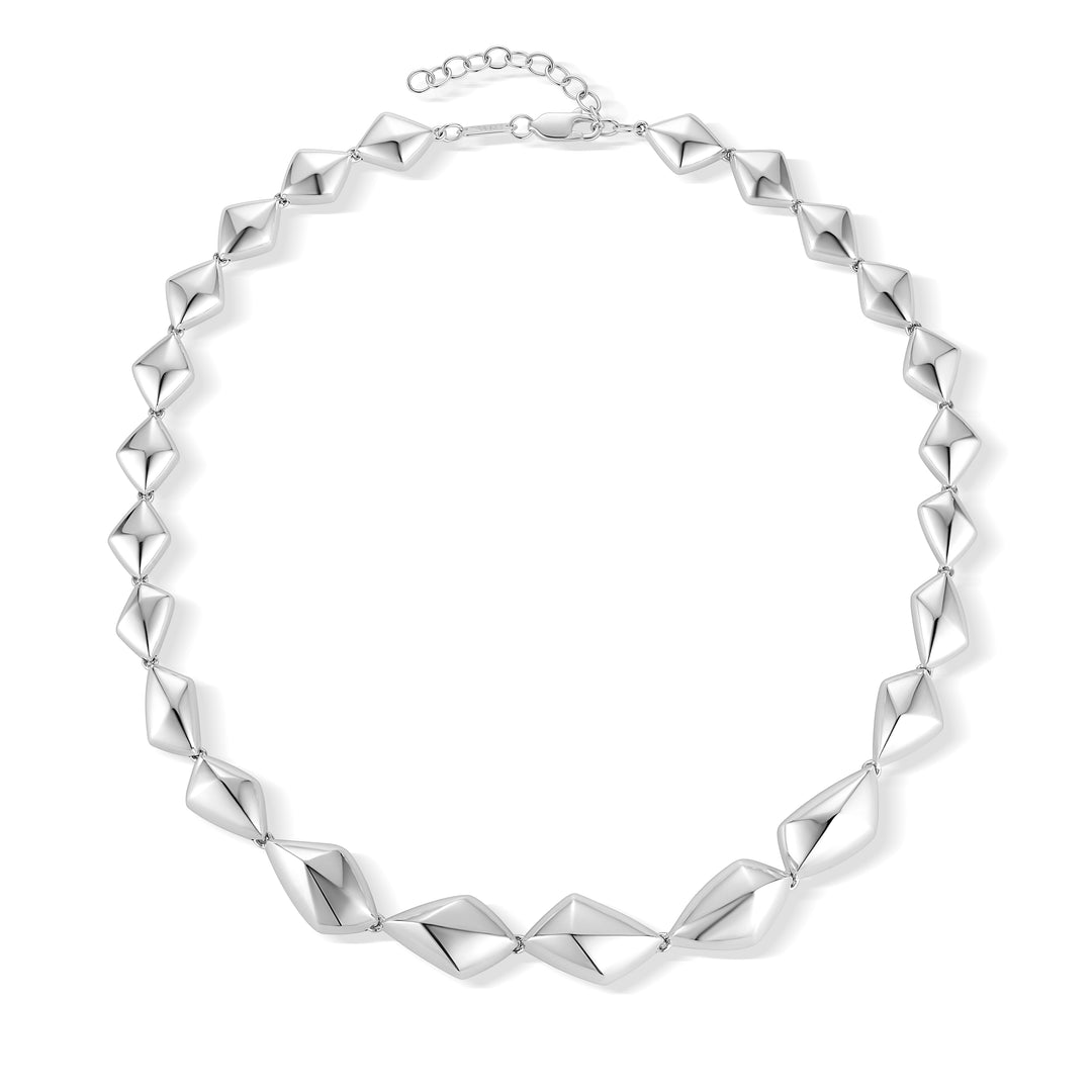 Forma Collar Necklace in sterling silver on white background.