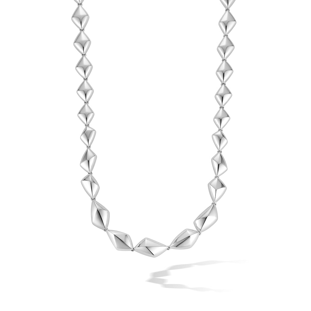 Forma Collar Necklace in sterling silver on white background.