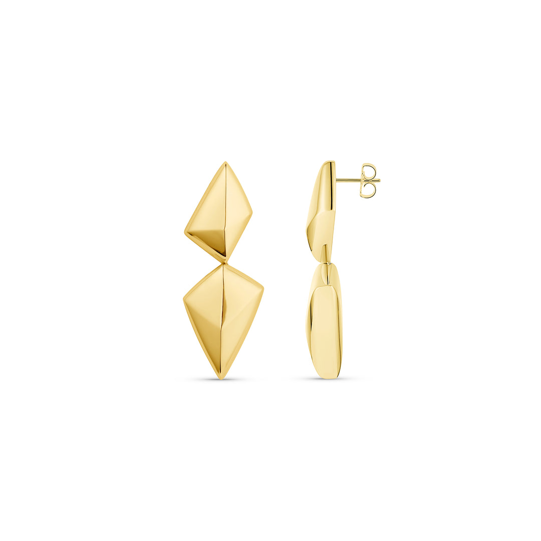 Gold geometric earrings on a white background