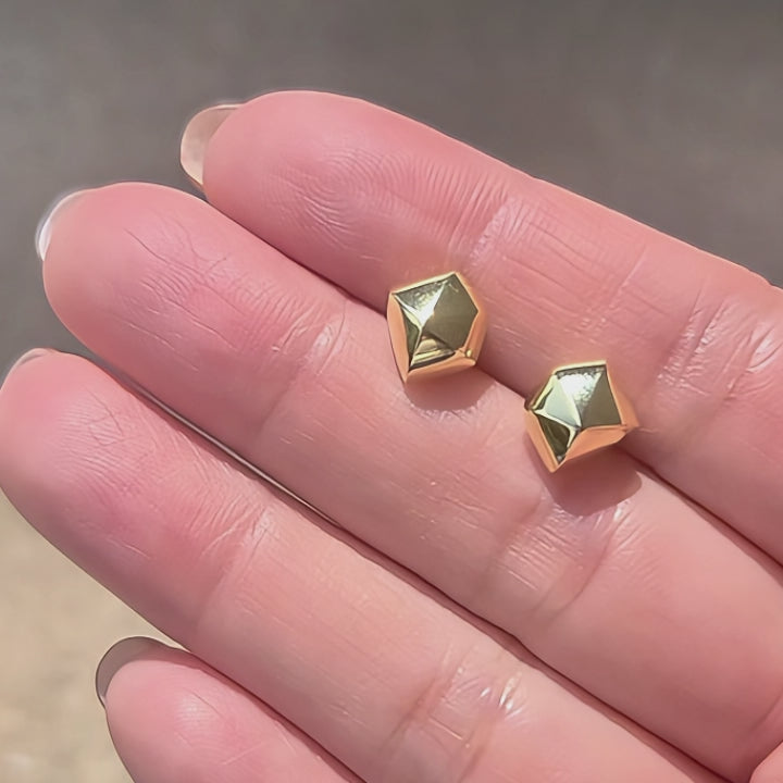 Geometric Gold vermeil stud earrings on hand video